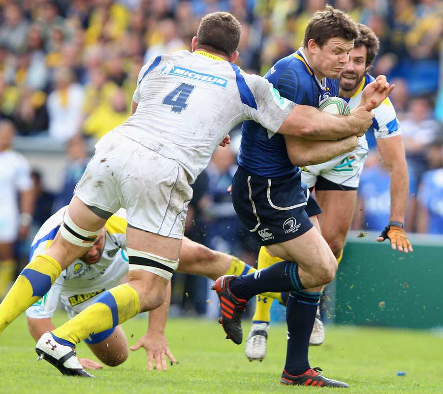 Leinster centre Brian O'Driscoll feels the force of a tackle