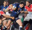 Montpellier's Francois Trinh-Duc takes the ball into contact against Biarritz
