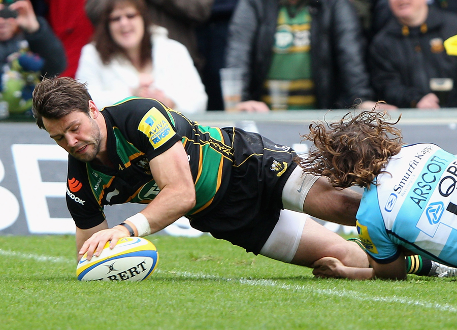 Northampton's Ben Foden dives over the line