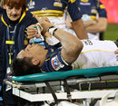 The Brumbies' Christian Lealiifano is stretchered from the field