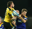 The Hurricanes' Andre Taylor claims a high ball