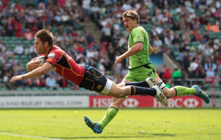Marcos Poggi of Spain scores a try during the plate semi-final 