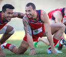 Reds' fly-half Quade Cooper jokes with Digby Ioane