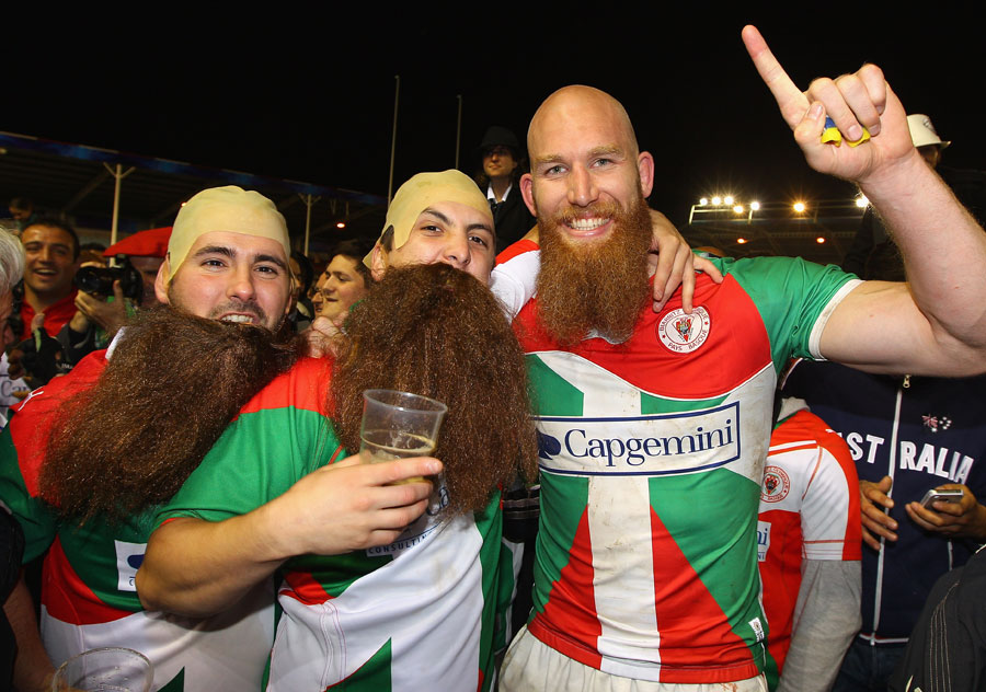 Biarritz lock Eric Lund celebrates with some fans