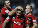 Crusaders flyer Zac Guildford is congratulated on his try