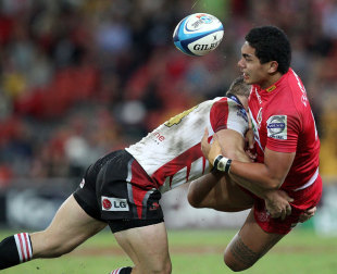 Chris Feauai-Sautia is tackled by Deon Van Rensburg,  Reds v Lions, Super Rugby, Brisbane, May 19, 2012 