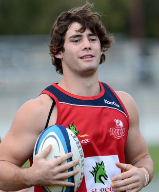 Reds flanker Liam Gill grabs the ball at training, Brisbane, Australia, May 21, 2012