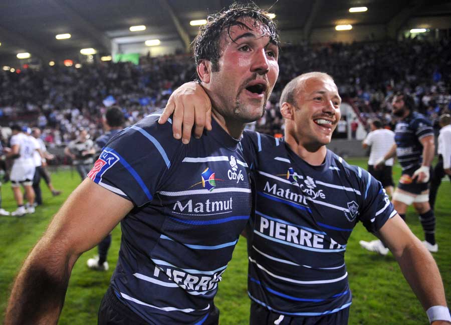 Castres' Romain Cabannes and Thomas Sanchou celebrate victory
