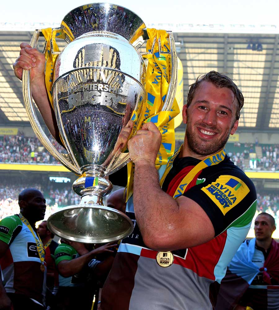 Harlequins skipper Chris Robshaw shows his delight with the Premiership trophy
