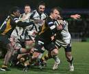 Wasps' Mark van Gisbergen looks to shake off a tackle against Sale