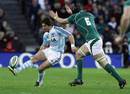 Ireland flanker Stephen Ferris tries to charge down Rafael Carballo's kick