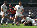 The Barbarians' Mils Muliaina stretches to score a try