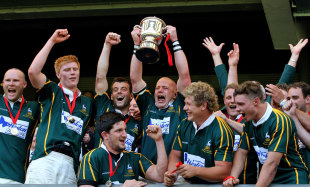 Hertfordshire captain Brett McNamee lifts the Bill Beaumont Cup