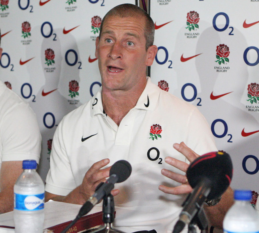England coach Stuart Lancaster talks to the media