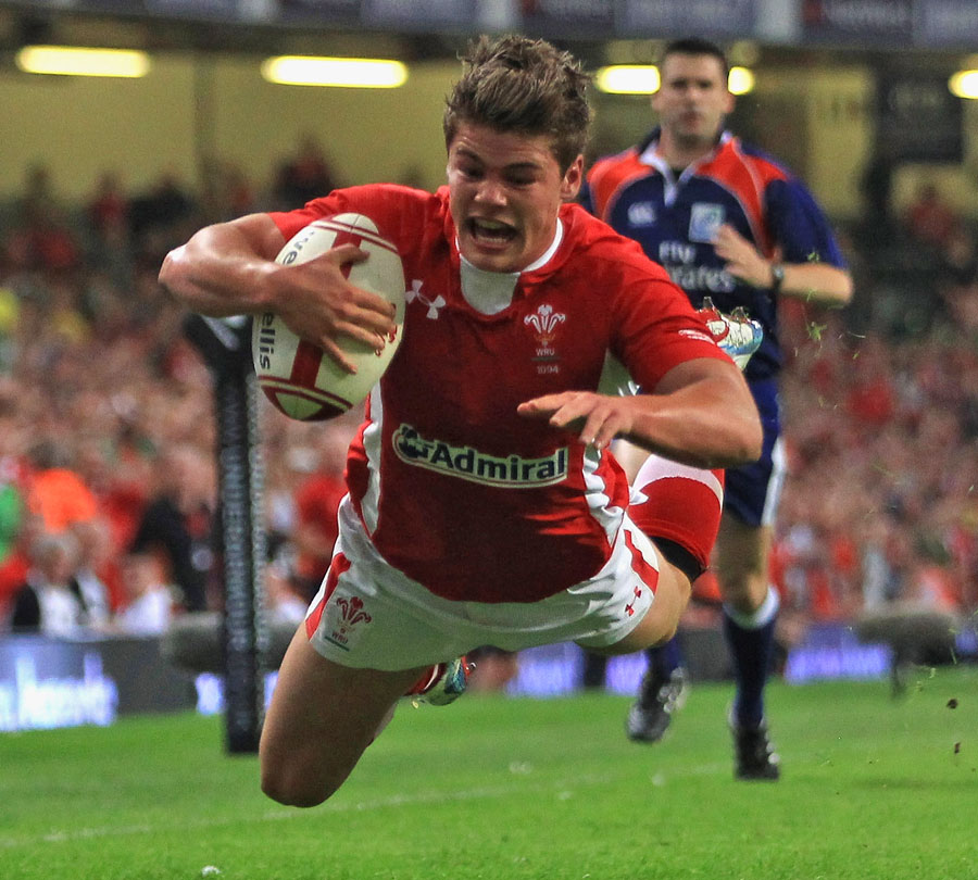 Wales' Harry Robinson dives over against the Barbarians