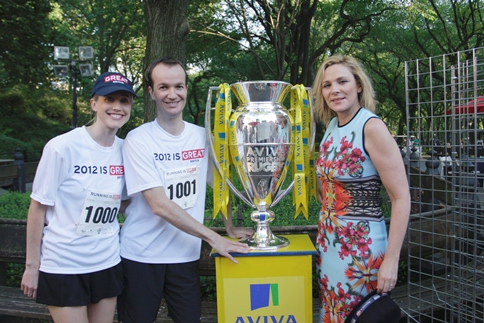 Actress Kim Cattrall gets up-close-and-personal with the Aviva Premiership trophy