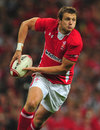 Wales' Dan Biggar looks to shift the ball