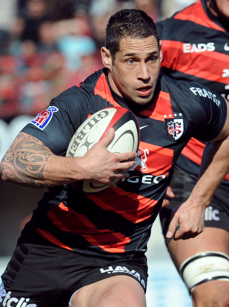 Toulouse's Luke McAlister on the charge