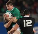Ireland centre Brian O'Driscoll is wrapped up by Sonny Bill Williams