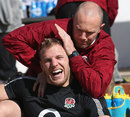 England's James Haskell receives treatment from physio Dan Lewindon 