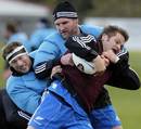 Kieran Read gets to grips with Richie McCaw