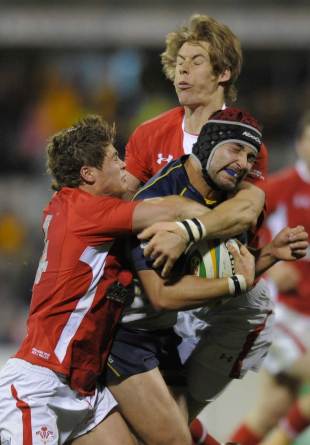 Harry Robinson and Liam Williams try to halt Colby Faingaa's charge, Brumbies v Wales, Canberra, Australia, June 12, 2012