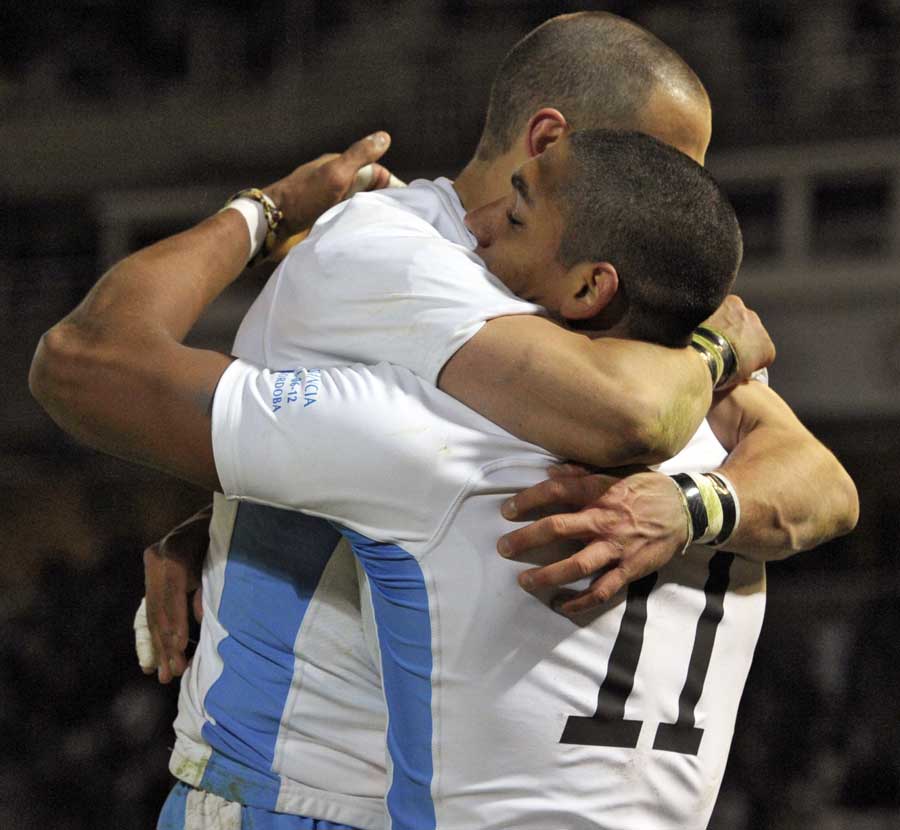 Argentina wing Manuel Montero is congratulated after scoring