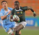 South Africa's Raymond Rhule exploits some space
