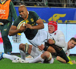 South Africa's JP Pietersen is tackled by England's Tom Johnson