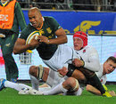 South Africa's JP Pietersen is tackled by England's Tom Johnson