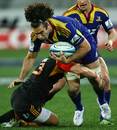 The Highlanders' Nick Crosswell is tackled