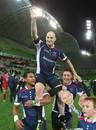 The Rebels' Stirling Mortlock is carried from the field
