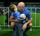Retiring Western Force lock Nathan Sharpe embraces his son