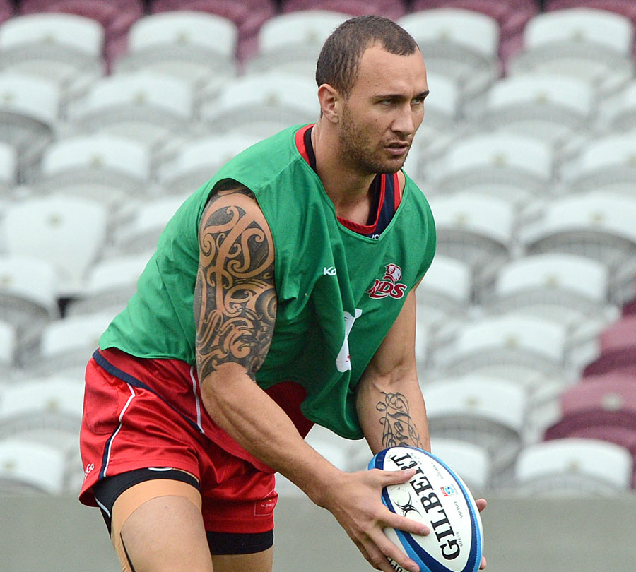 The Reds' Quade Cooper warms up for his side's latest Super Rugby outing