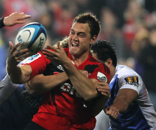 The Crusaders' Israel Dagg is shackled by Western Force defenders, Crusaders v Western Force, Super Rugby, Christchurch, New Zealand, July 14, 2012