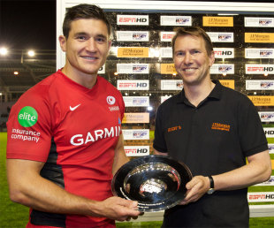 Saracens skipper Nils Mordt receives the silverware after a tough night's work at the sevens, J.P. Morgan Asset Management Sevens Series, The Stoop, London, England, July 14, 2012