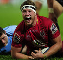 James Slipper celebrates the Reds' third try of the night
