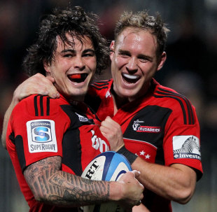 Zac Guildford (left) and Andy Ellis celebrate the Crusaders' opening try in the Super Rugby qualifier against the Bulls. Crusaders v Bulls, Super Rugby, Rugby League Park, Christchurch, New Zealand, July 21, 2012