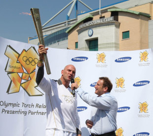 Lawrence Dallaglio with the Olympic torch, London, England, July 26, 2012