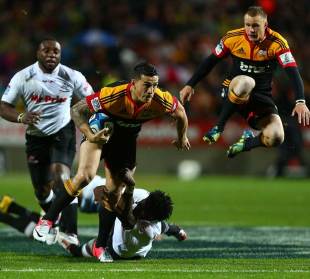 Chiefs centre Sonny Bill Williams attempts to break a tackle, Chiefs v Sharks, Super Rugby Final, Waikato Stadium, Hamilton, New Zealand, August 4, 2012