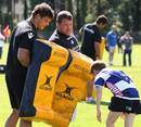 Edinburgh's Ross Ford holds tackle bags at training