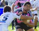 Stade Francais' Laurent Sempere takes the ball into contact