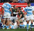 South Africa flanker Marcell Coetzee is congratulated after scoring