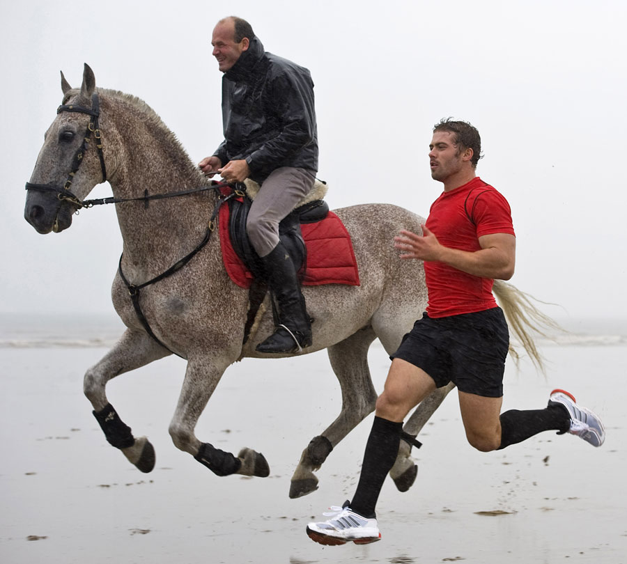 Wales' Leigh Halfpenny races a horse as part of a TV campaign