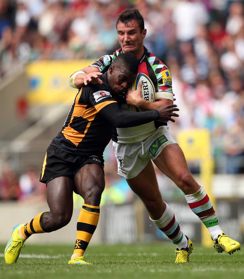 Harlequins wing George Lowe battles with Christian Wade