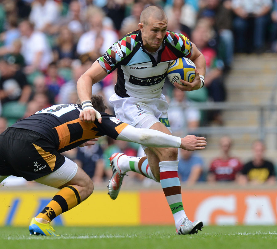 Harlequins' Mike Brown takes on the Wasps defence