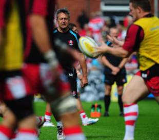 Gloucester coach Nigel Davies casts an eye over the warm-up