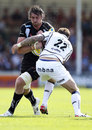 Exeter's Al Muldowney takes the attack to Sale's Danny Cipriani