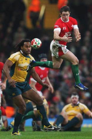 Shane Williams of Wales fails to gather the high ball as Lote Tuqiri of Australia closes in during the match between Wales and Australia at the Millennium Stadium in Cardiff Wales on November 29, 2008. 