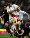 England's Nick Easter breaks through a gap in the New Zealand defence